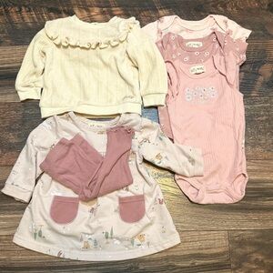 Girls 6 piece bundle size 3-6 months, includes an outfit 3 onesies and a top